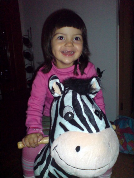 cecilia got a riding-zebra for christmas